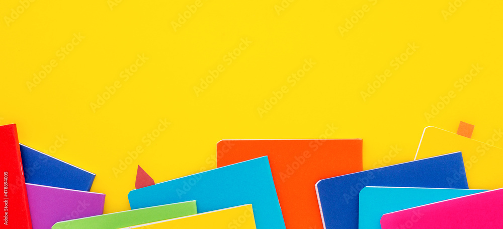 School notebooks with yellow copy space. Banner. School notebooks with yellow copy space. Banner.