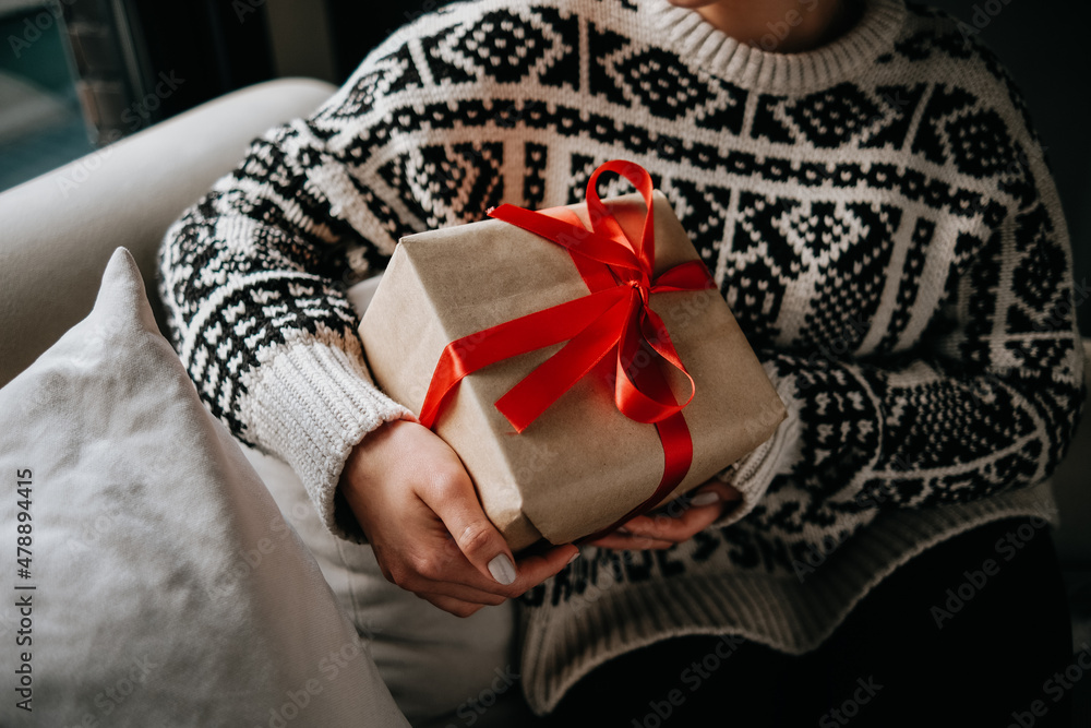gift package in woman's hand gift package in woman's hand