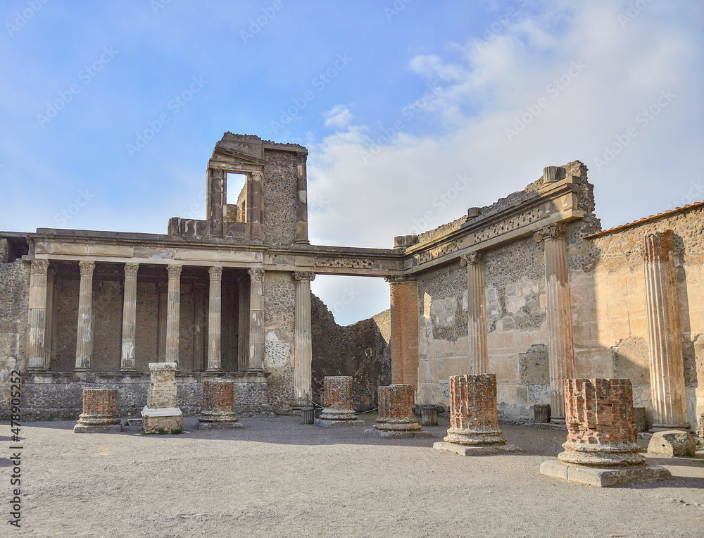 Fototapeta premium Blue sky above the ruined Roman city Forum of Pompei. The Forum represented by main square where main civil activities were carried out, both religious and commercial.