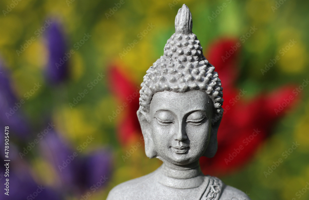Buddha Statue With Field of Yellow Flowers in Background Shallow DOF