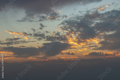 Beautiful sunset sky above clouds with dramatic light, Beautiful blazing sunset landscape, Space for text, No focus, specifically