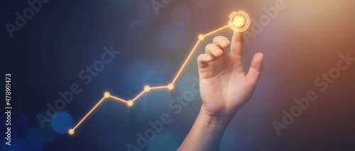 Targeting the business concept, Businessman touching business target on virtual screen, target in his hand Planning for success, Set goals for better results. photo