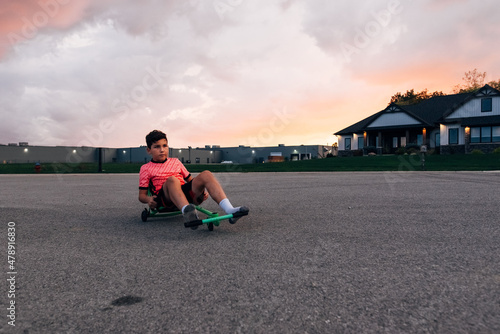 Boy blissfully happy while riding. 