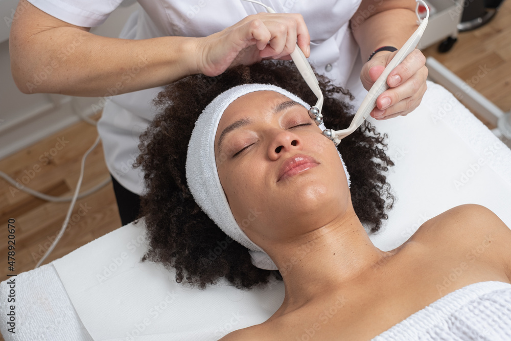 Woman Having A Facial Electro Treatment Close Up Woman Having A Facial Electro Treatment Close Up