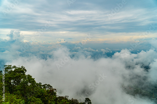 city on a hill covered with clouds from Telomoyo Mountain, Central Java, Indonesia photo