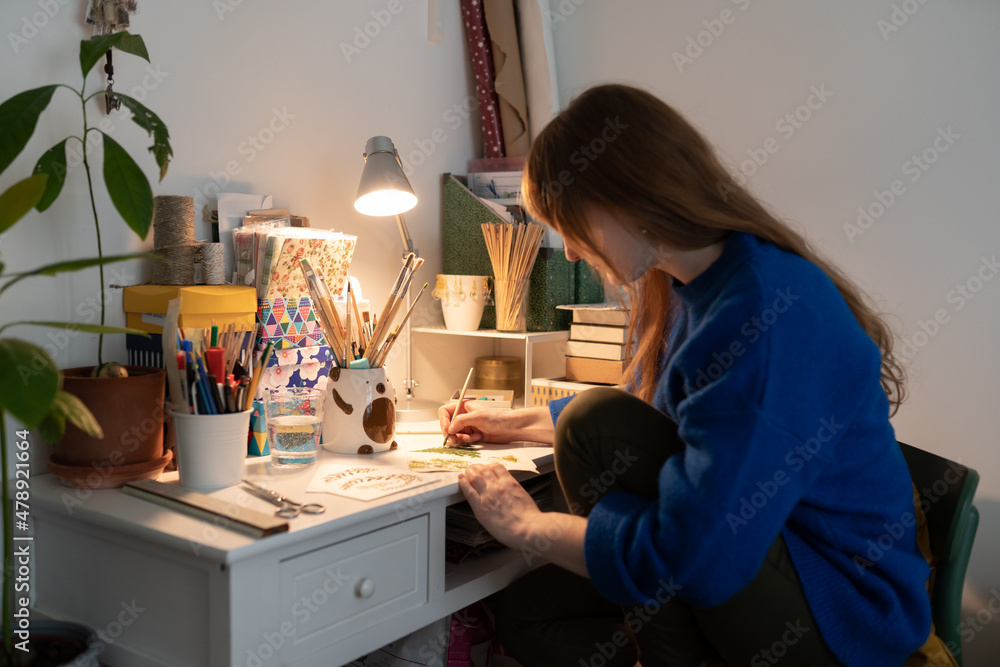 Woman Drawing At Home In The Room Woman Drawing At Home In The Room