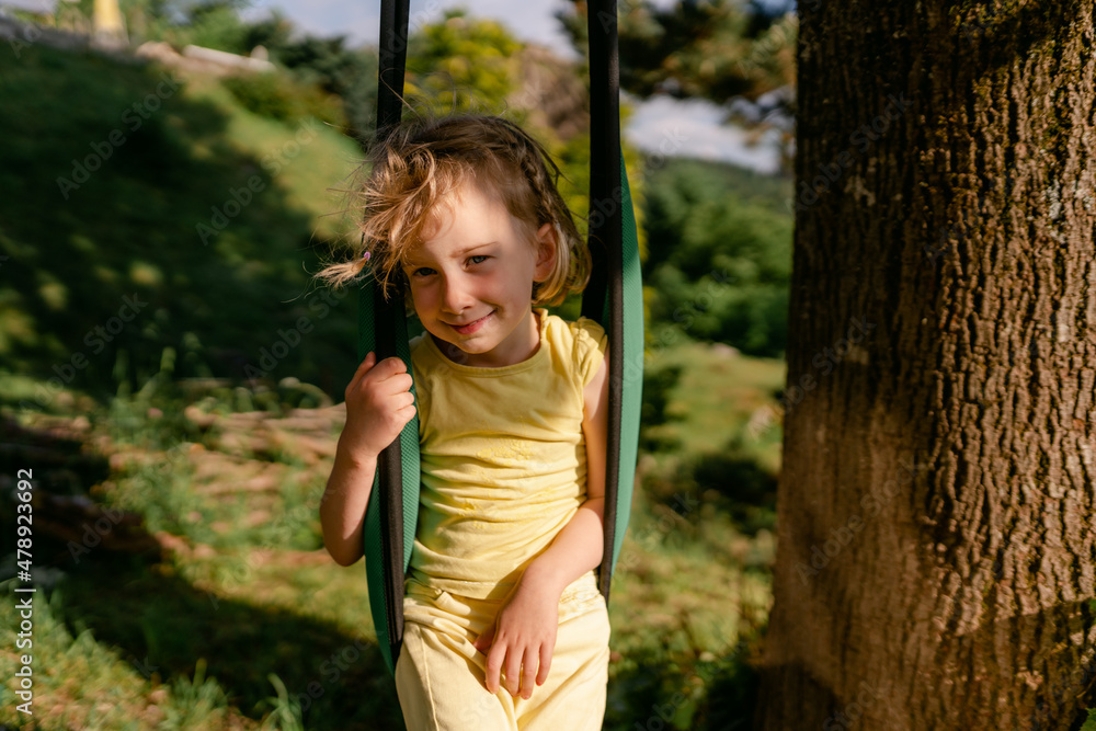 little girl on a swing little girl on a swing