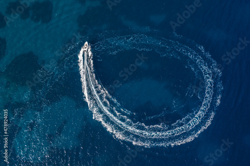 circular wake of a motorboat  photo