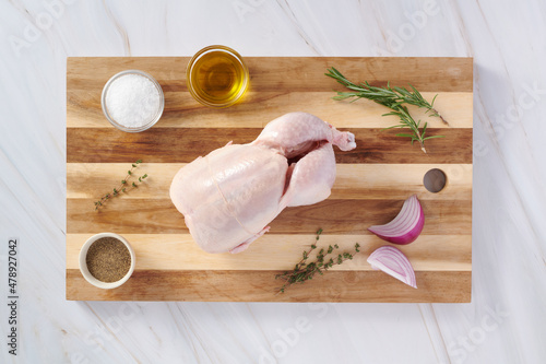 Raw Whole Chicken Ready for cooking  photo