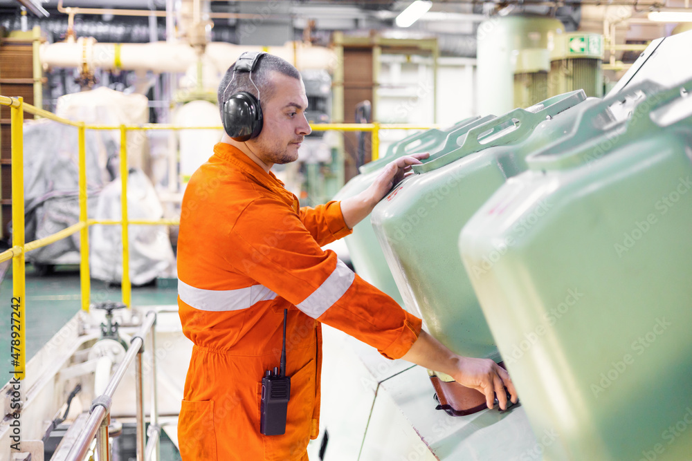 ship mechanic works with diesel generator ship mechanic works with diesel generator