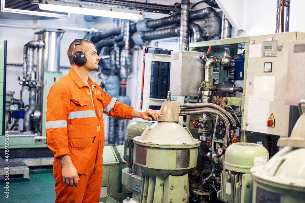 engineer in engine room checks work separator engineer in engine room checks work separator