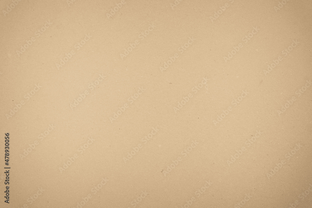 Brown recycled craft paper texture as background. Cream paper texture, Old vintage page or grunge vignette. Brown recycled craft paper texture as background. Cream paper texture, Old vintage page or grunge vignette.