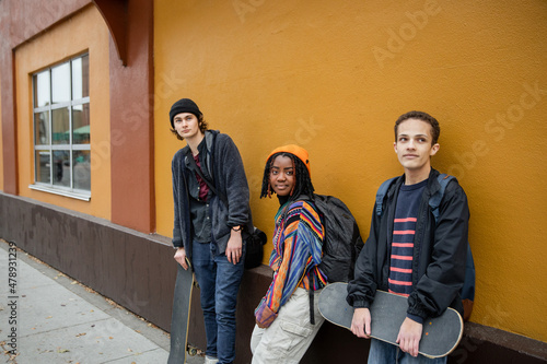 Three Teenagers Hang Out Downtown
