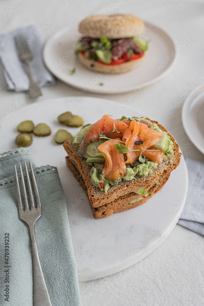 Healthy smoked salmon sandwitch with avocado Healthy smoked salmon sandwitch with avocado
