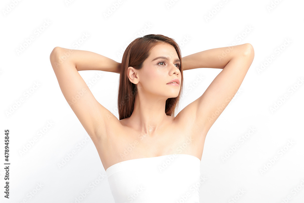 Beautiful Young Asian woman lifting hands up to show off clean and hygienic armpits or underarms on white background, Smooth armpit cleanliness and protection concept Beautiful Young Asian woman lifting hands up to show off clean and hygienic armpits or underarms on white background, Smooth armpit cleanliness and protection concept
