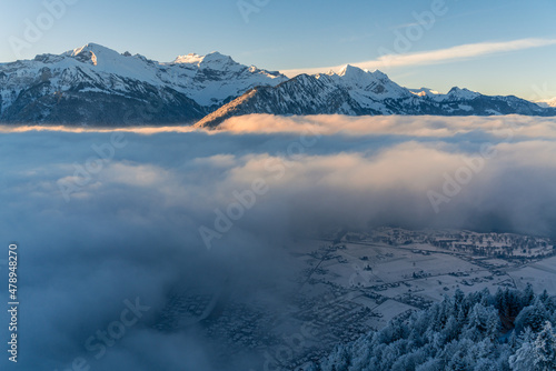 An alpine city under the fog inversion