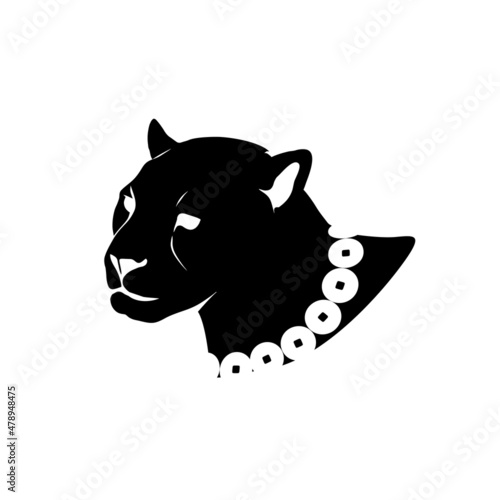 cougars head with a calm expression on her face, a necklace around her neck