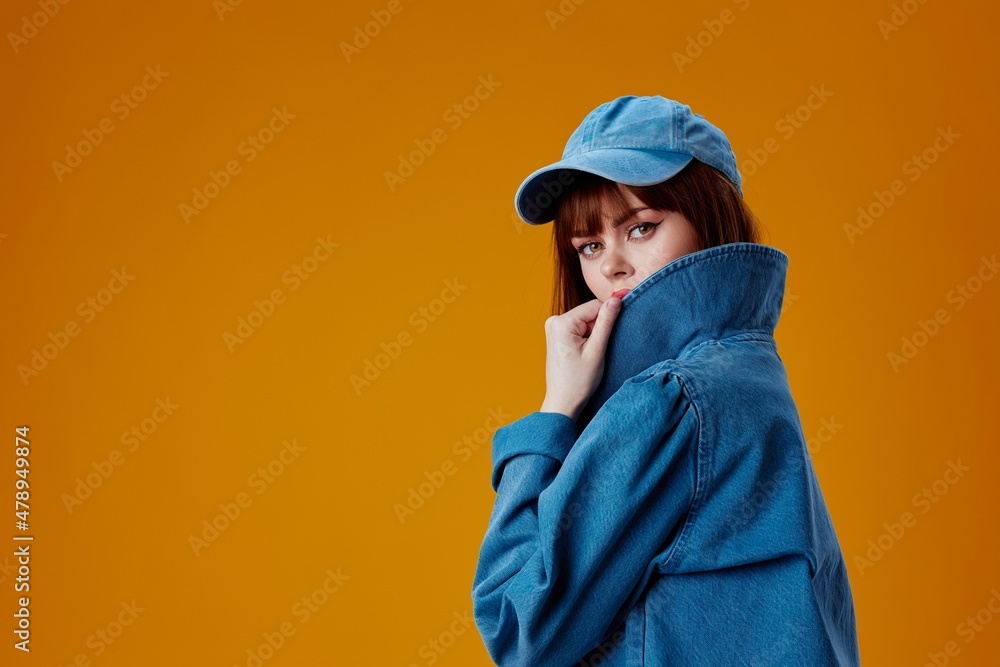 Pretty young female denim clothing fashion posing cap studio model unaltered Pretty young female denim clothing fashion posing cap studio model unaltered