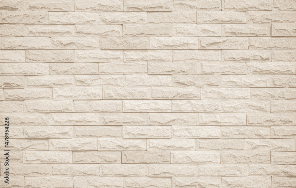 Cream and beige brick wall texture background. Brickwork and stonework flooring interior rock old pattern design. Background of old vintage brick wall backdrop Cream and beige brick wall texture background. Brickwork and stonework flooring interior rock old pattern design. Background of old vintage brick wall backdrop