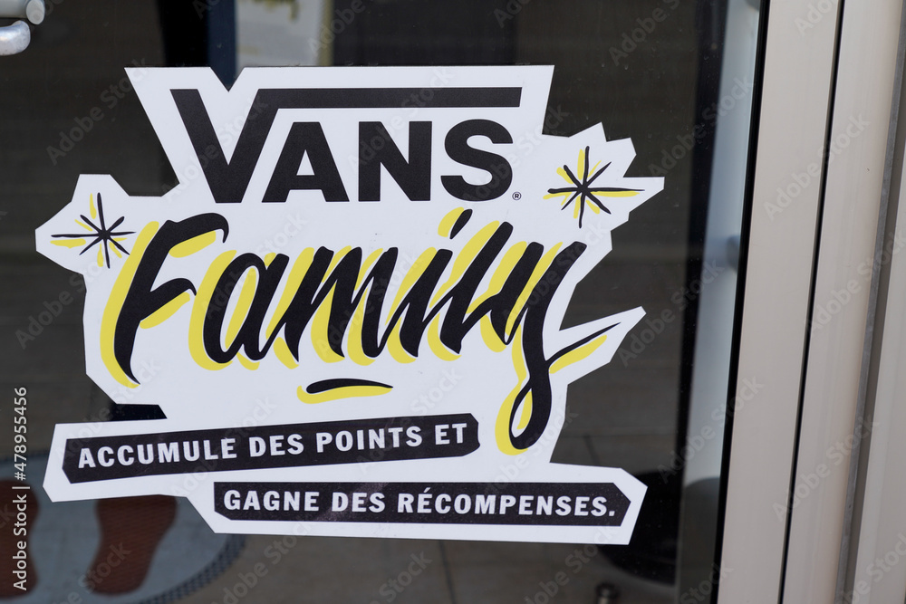 Foto Stock Vans family logo text and brand sign for fashion store us  footwear shoes apparel company specialized in skateboard | Adobe Stock