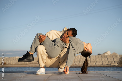 Dancers representing death and life while dancing photo