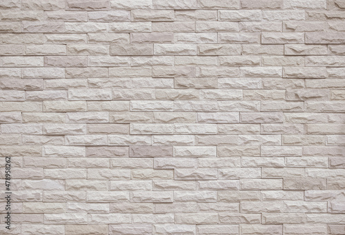 Cream and white brick wall texture background. Brickwork and stonework flooring interior rock old pattern old vintage brick wall backdrop decoration