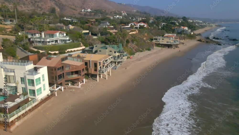 Aerial view of homes at the beach facing the ocean in Malibu California Aerial view of homes at the beach facing the ocean in Malibu California