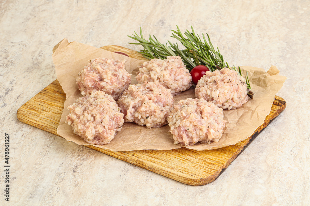 Traditional homemade raw pork meatballs Traditional homemade raw pork meatballs