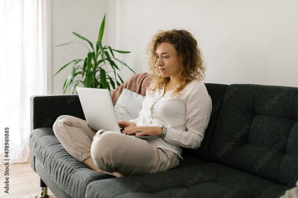 Young woman working from home on the computer Young woman working from home on the computer