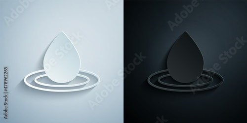 Paper cut Water drop icon isolated on grey and black background. Paper art style. Vector