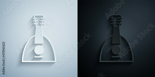 Paper cut Musical instrument balalaika icon isolated on grey and black background. Paper art style. Vector