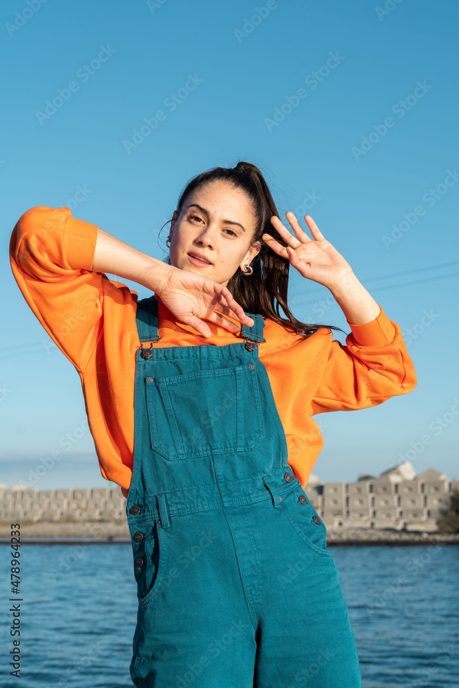 Portrait of beautiful fun young woman dancing Portrait of beautiful fun young woman dancing