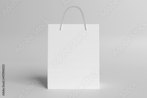 Shopping bag mockup on white. Template of a blank paper shop sack on empty texture. 3D rendering