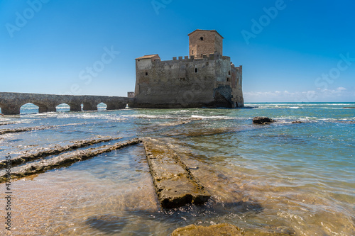 Torre Astura is a medieval castle located in Neptune province of Rome. The tower was built by the Frangipane family starting from 1193, to protect themselves from the numerous raids of the Saracens
