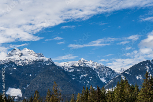 panorama of huge mountains covered by snow british columbia canada © olegmayorov