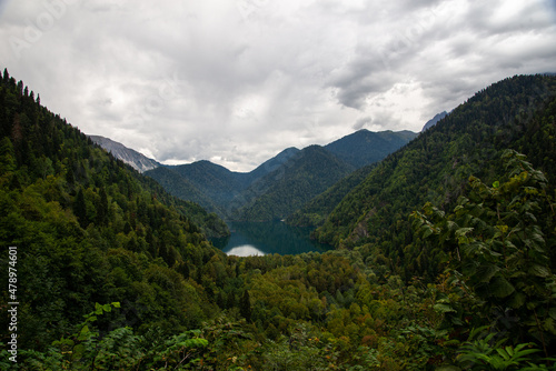 Beautiful mountain Lake Ritsa. Lake Ritsa in the Caucasus Mountains, in the north-western part of Abkhazia, Georgia, surrounded by mixed mountain forests and subalpine meadows.