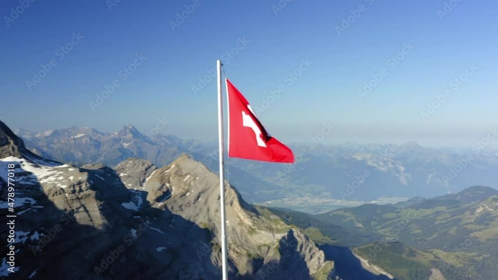 Aerial Panning Red Flag Of Switzerland At Observation Point, Drone Flying During Winter Season - Vaud, Switzerland