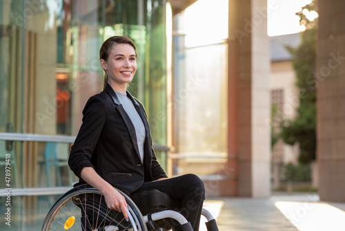 Disabled businesswoman in a wheelchair photo