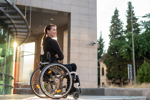 Disabled businesswoman in a wheelchair photo