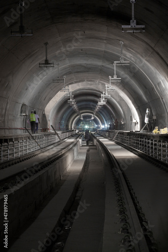 Underground facility with a big tunnel leading deep down. Metro - subway construction site.