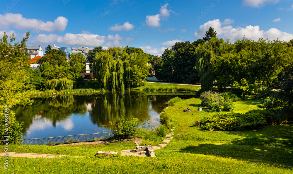 Obraz na płótnie Morskie Oko pond park below Pulawska and Dworkowa street in Mokotow district with Srodmiescie downtown view of Warsaw in Poland w salonie