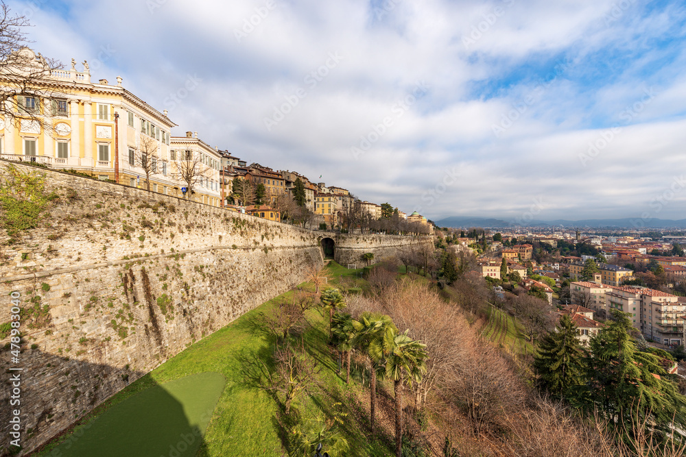 Cityscape of Bergamo in the hills (upper town) and plains (Bergamo Alta e Bassa) with the ancient Venetian surrounding walls (1561), UNESCO world heritage site, Lombardy, Italy, Europe.