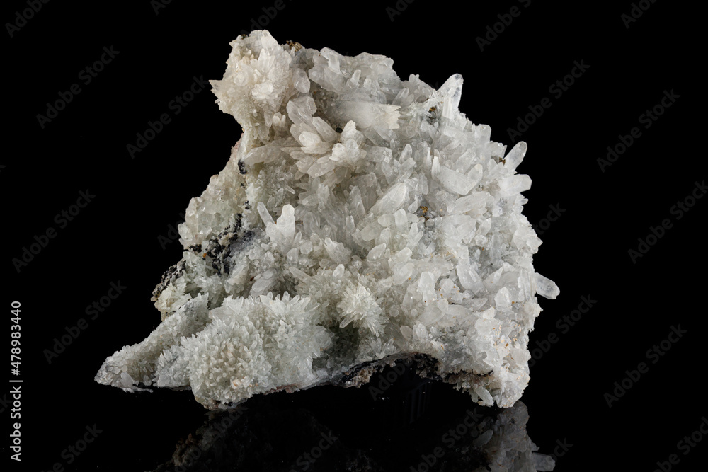 macro mineral stone Quartz Pyrite on a black background