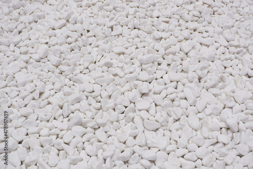 white river grit stones background. White marble gravel. Crushed stone texture.