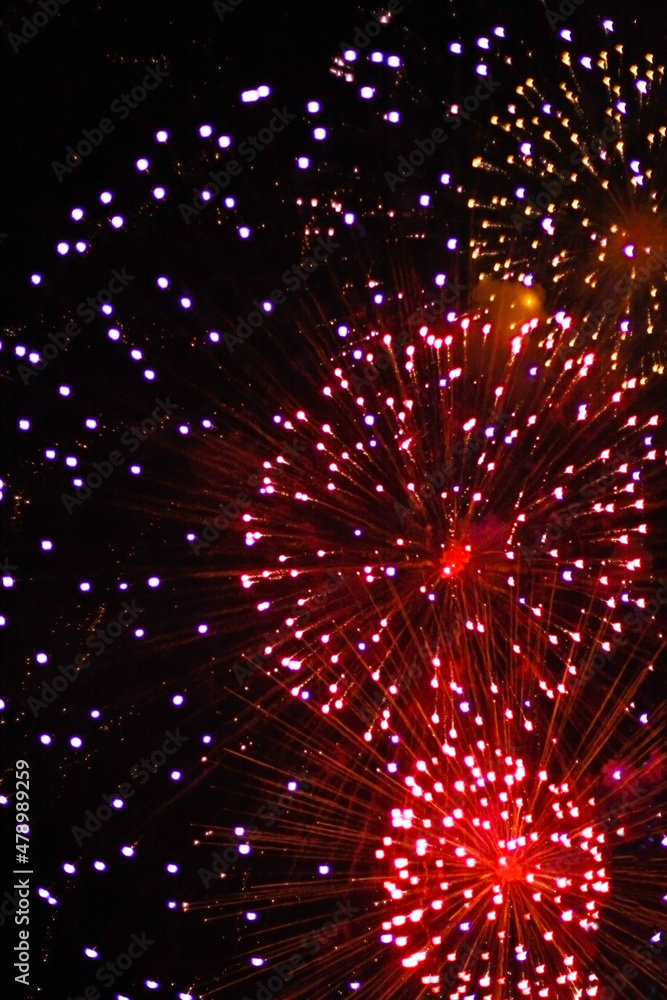 Fototapeta premium Red Fireworks on twilight background