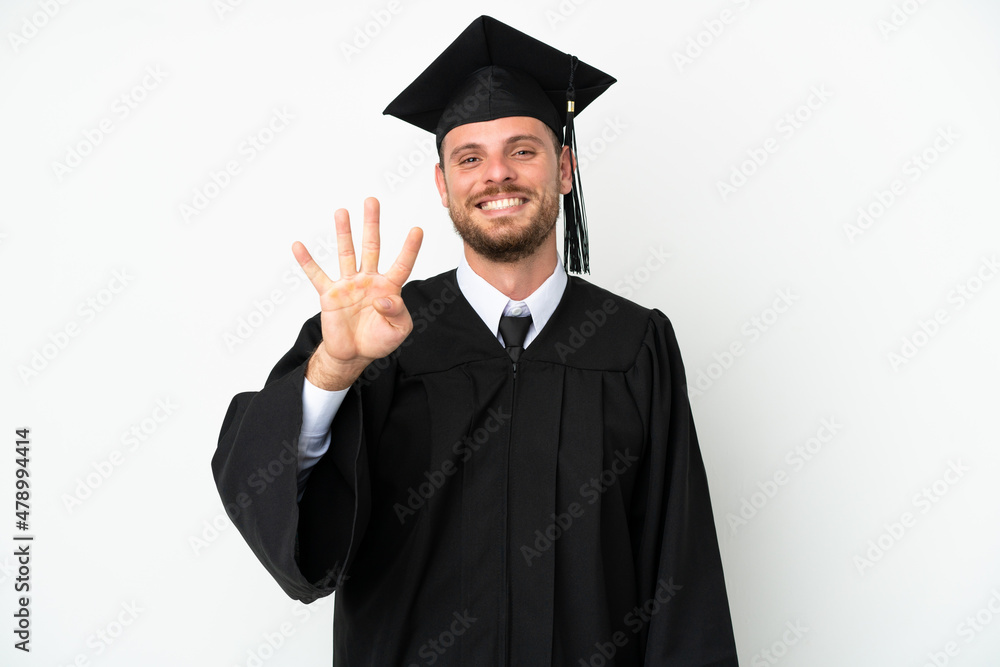 Young university Brazilian graduate isolated on white background happy and counting four with fingers Young university Brazilian graduate isolated on white background happy and counting four with fingers