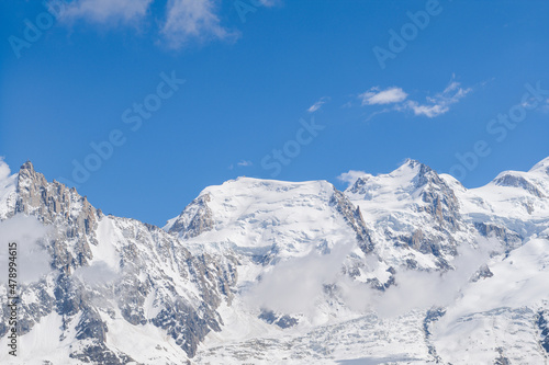 The close-up on Mont Blanc du Tacul and Mont Maudit in Europe, France, the Alps, towards Chamonix, in summer, on a sunny day. © Florent