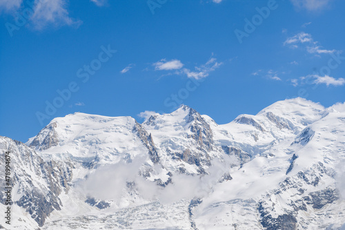 Mont Blanc du Tacul, Mont Maudit and Mont Blanc in Europe, France, the Alps, towards Chamonix, in summer, on a sunny day. © Florent