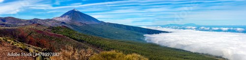 Panoramic view of the Teide National Park with the sea of ​​clouds and La Palma island in the background. Tenerife. Canary Islands. © linohoracio