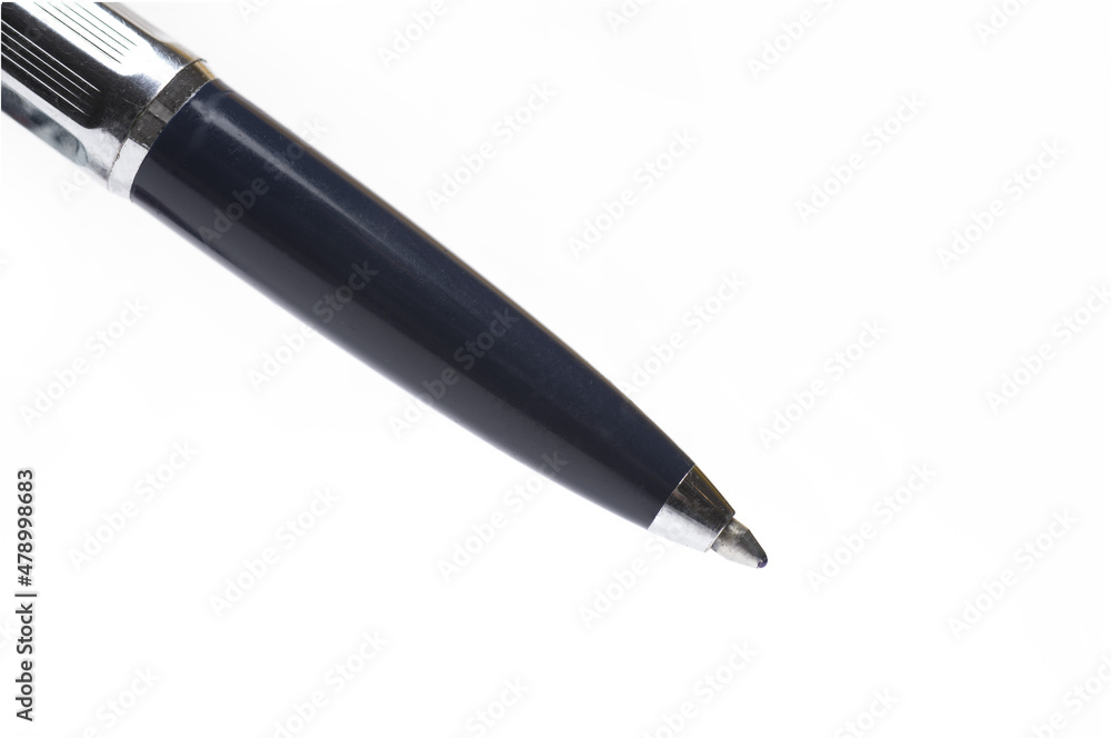 Closeup partial view ball pen white background Closeup partial view ball pen white background